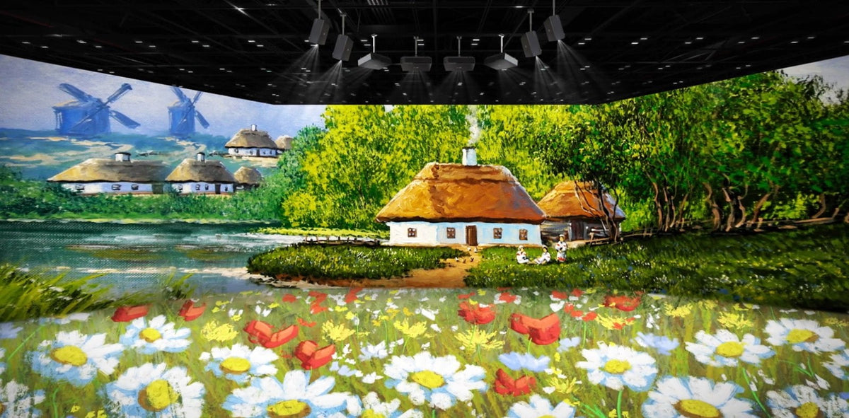 LG ProBeam projectors edge-blending one image across the walls and floor of a room
