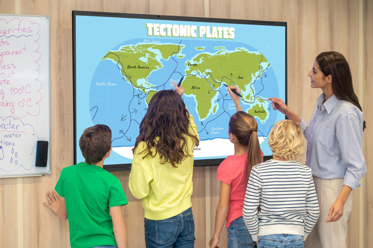 Pupils and a teacher working on a map lesson on a Clevertouch IMPACT Lux display