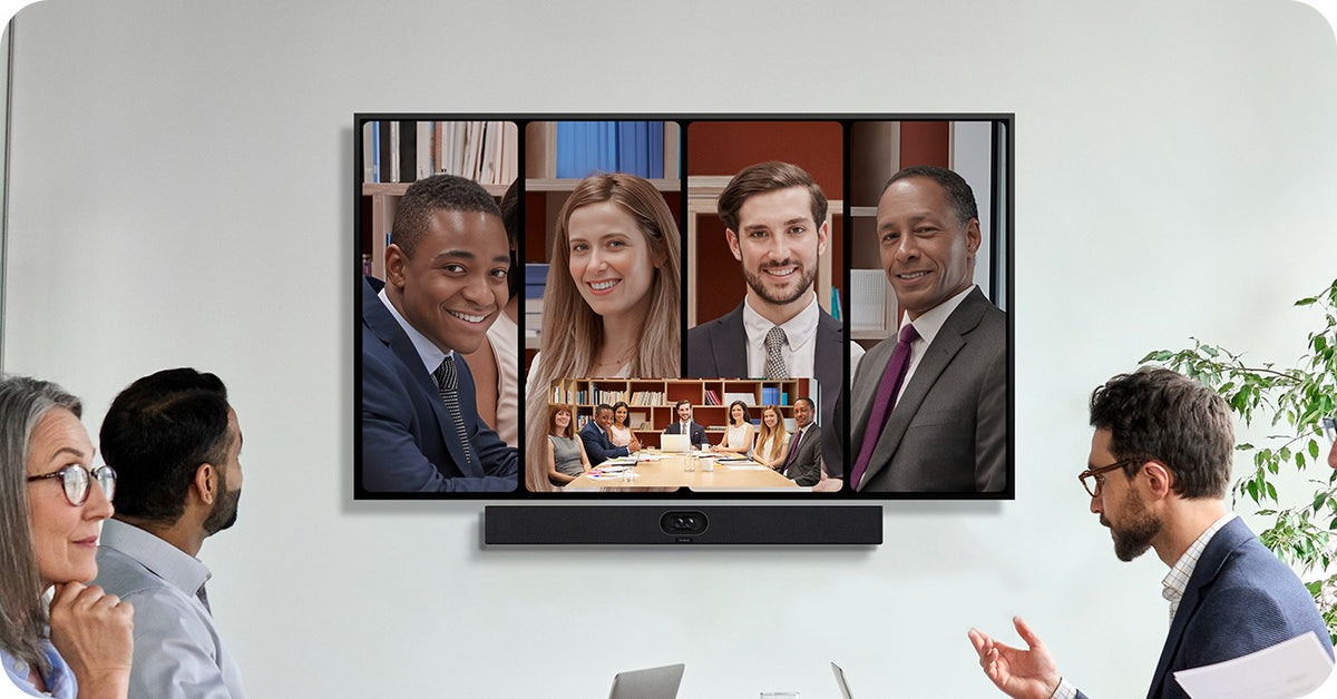 Yealink SmartVision 40 camera bar under a meeting room display showing remote participants