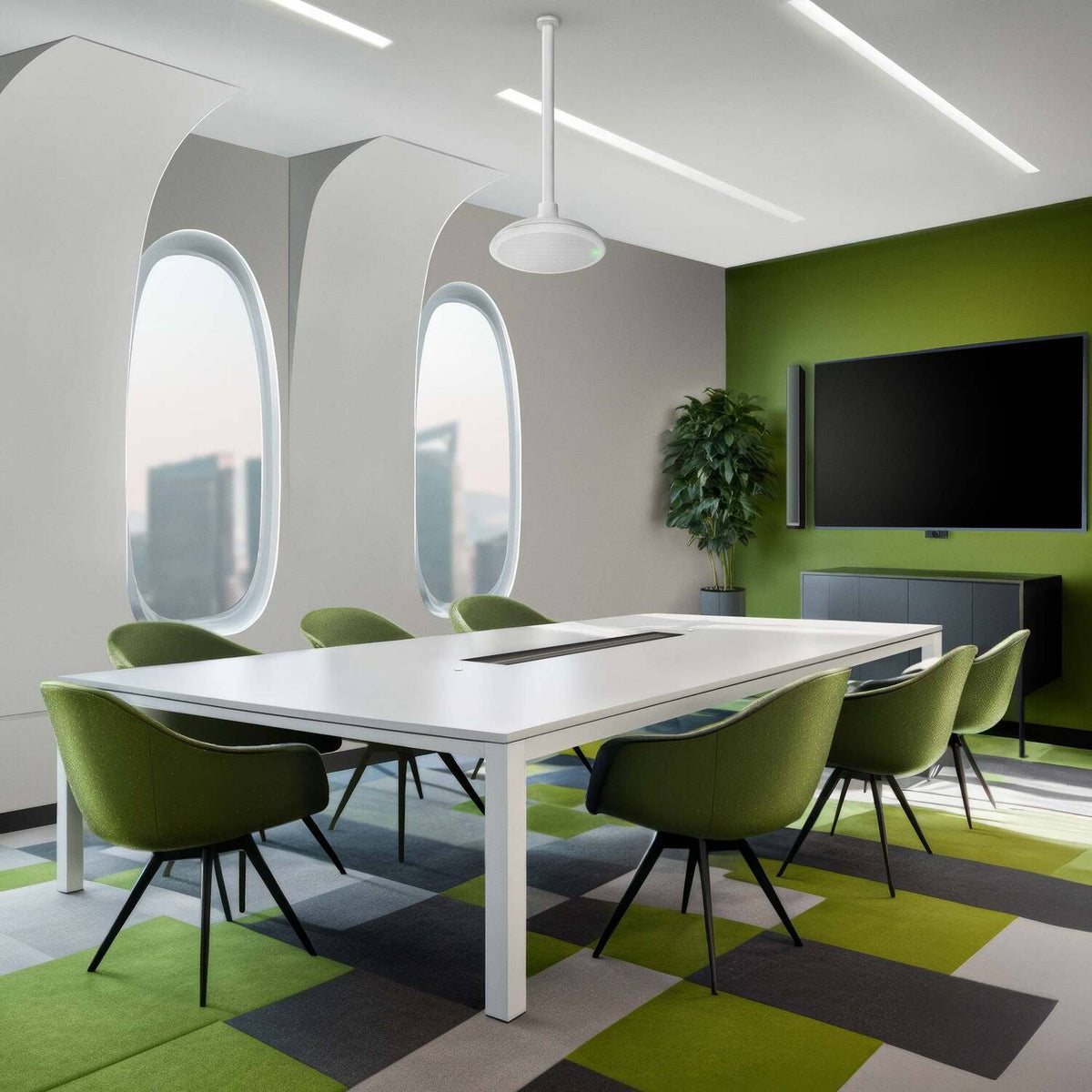 Shure MXA901 round ceiling array microphone suspended above a boardroom table